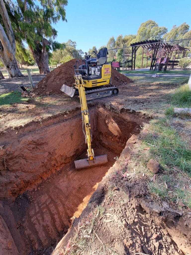 Dial A Digger - Excavator Digs Hole for a Pool